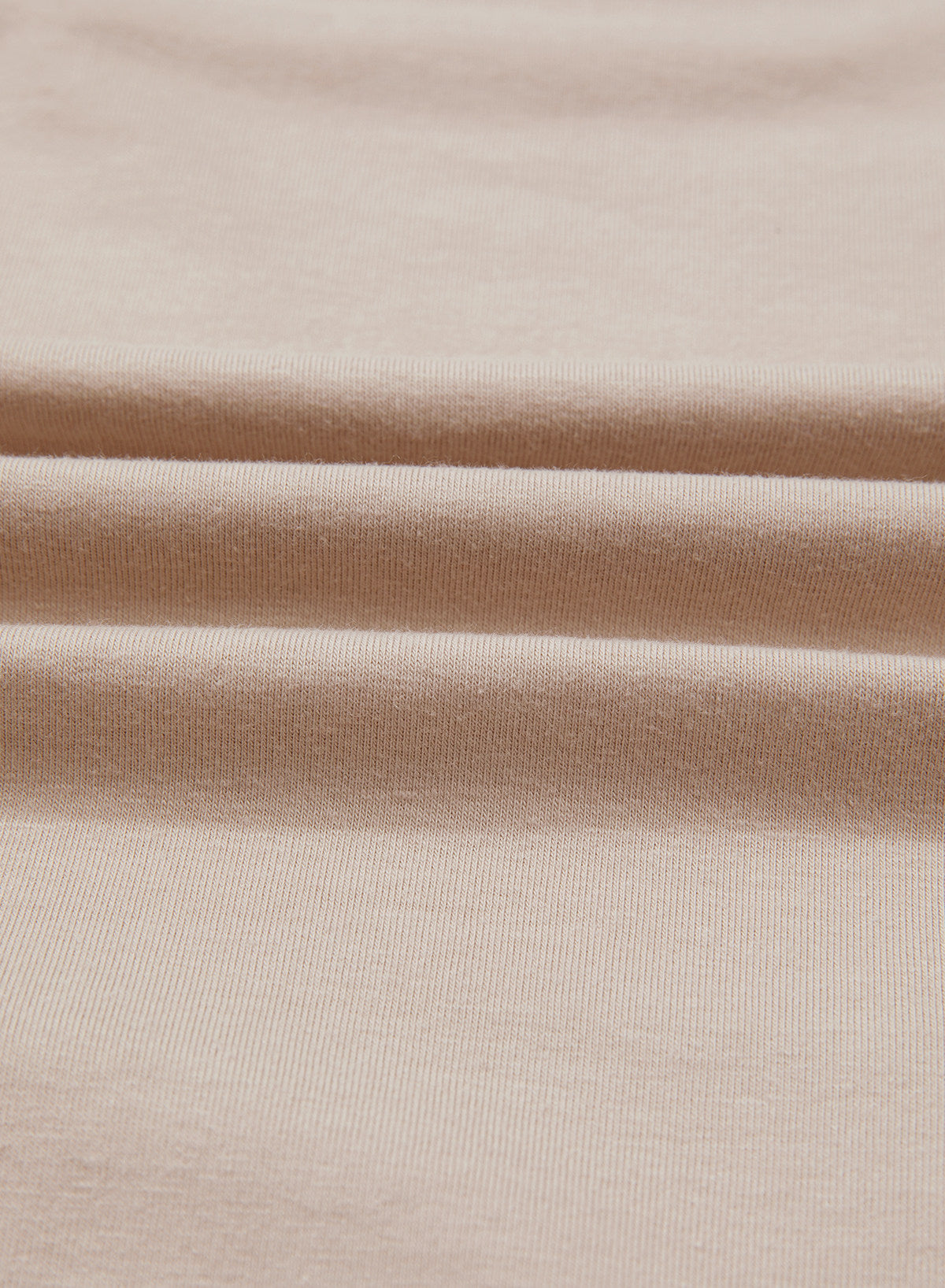 Camiseta tipo peplum con cintura ceñida y mangas 3/4 para uso casual en la oficina