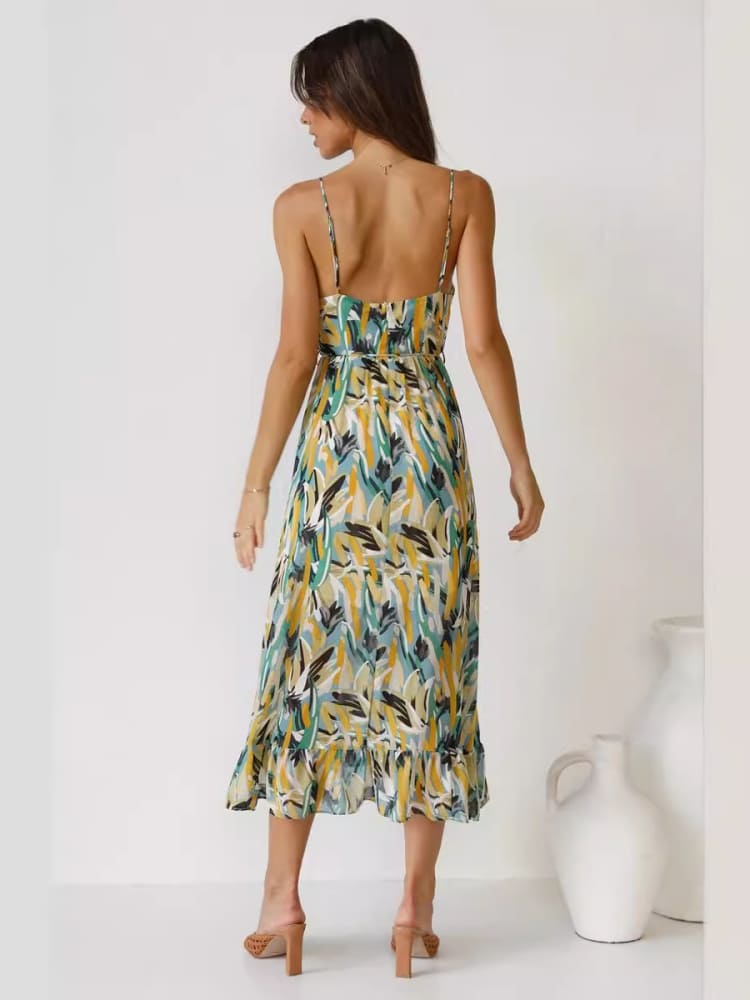 Vestido midi sin mangas con estampado floral y ribete de volantes delicados