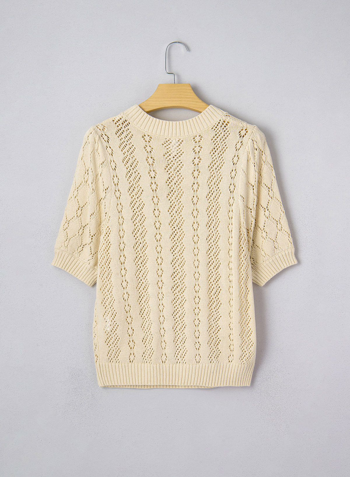 Camiseta tipo suéter hueca