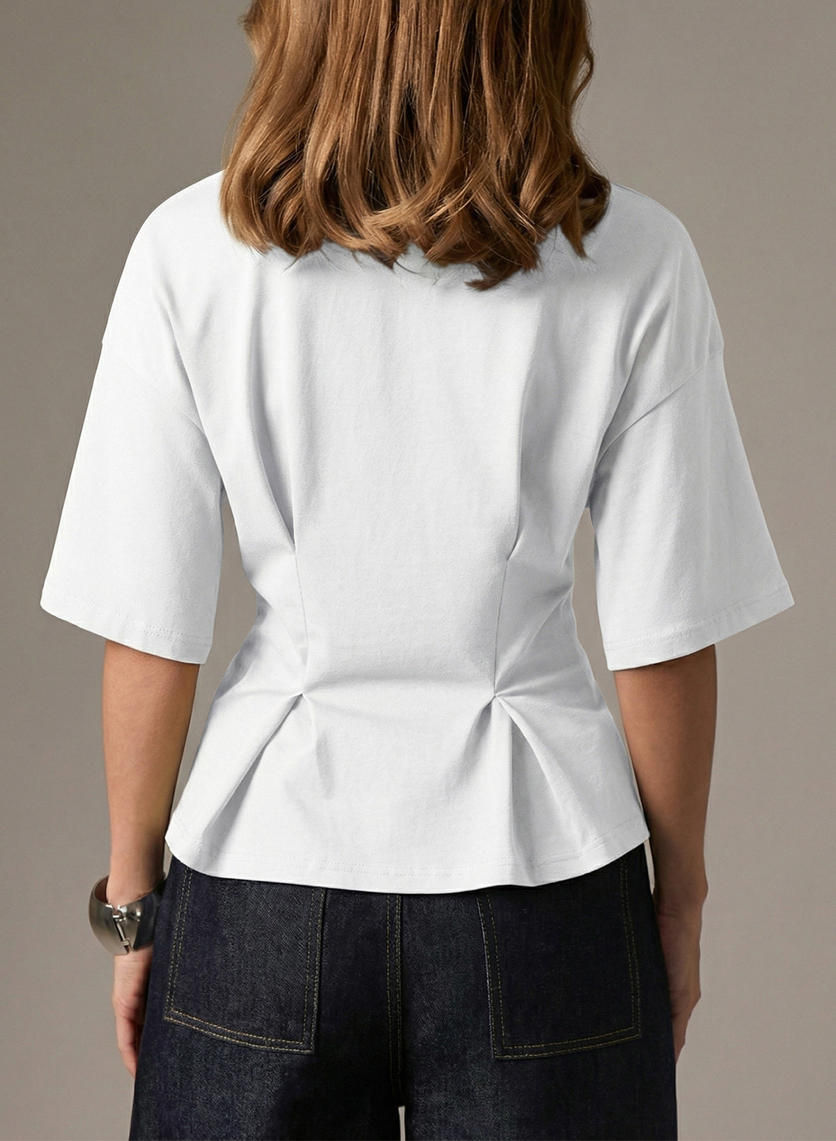 Camiseta tipo peplum con cintura ceñida y mangas 3/4 para uso casual en la oficina