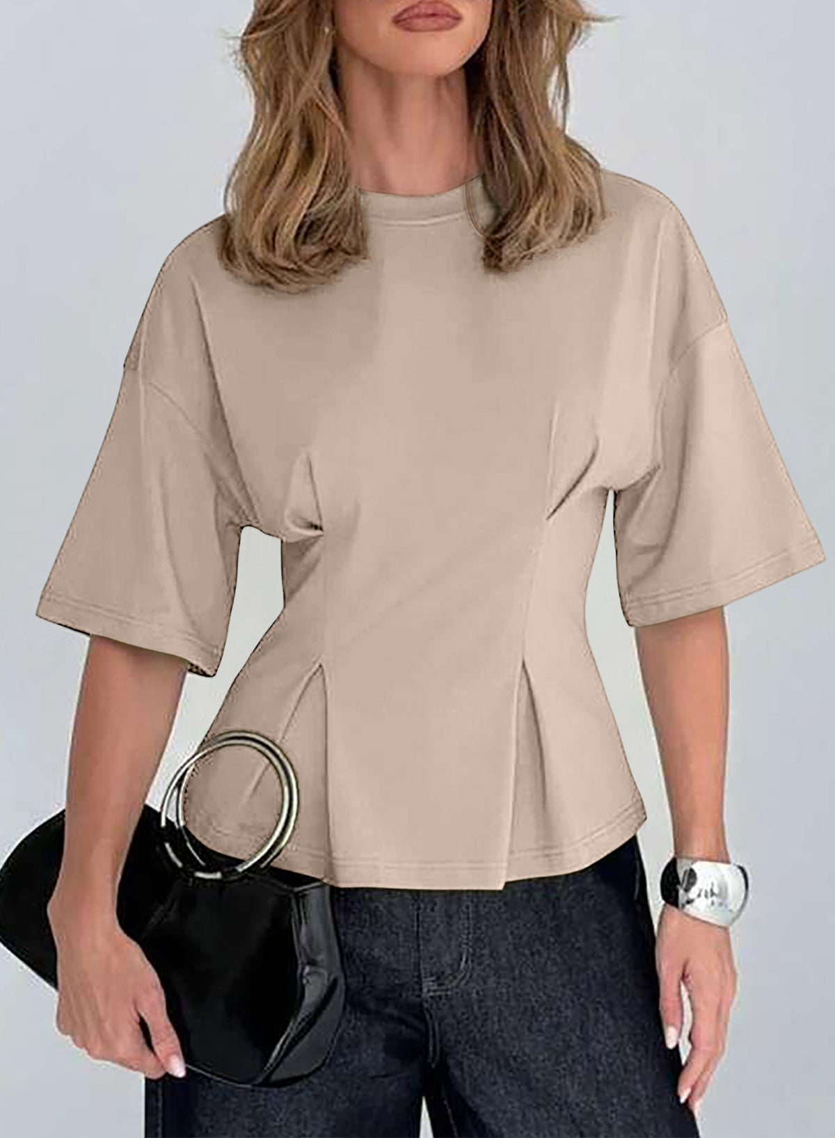 Camiseta tipo peplum con cintura ceñida y mangas 3/4 para uso casual en la oficina