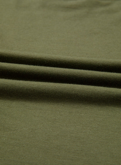 Camiseta tipo peplum con cintura ceñida y mangas 3/4 para uso casual en la oficina