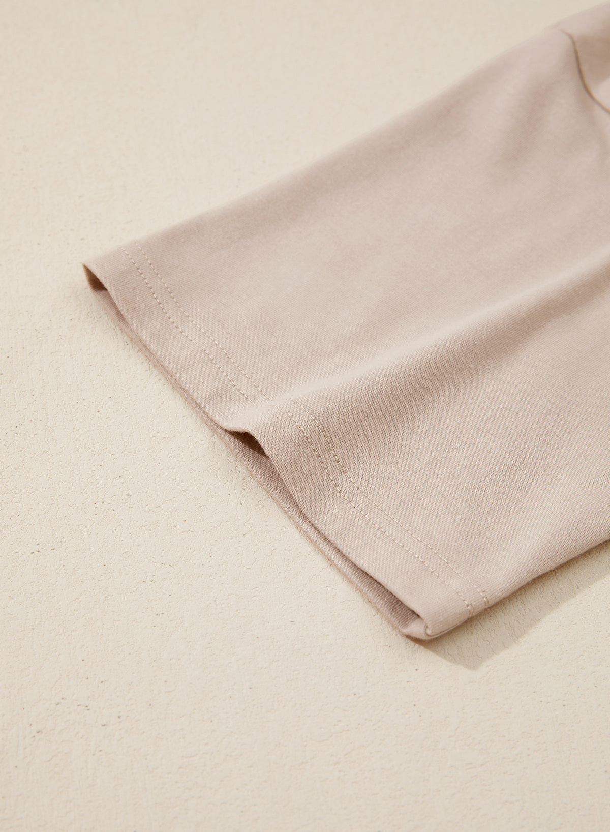 Camiseta tipo peplum con cintura ceñida y mangas 3/4 para uso casual en la oficina