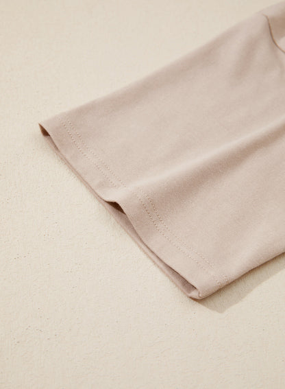 Camiseta tipo peplum con cintura ceñida y mangas 3/4 para uso casual en la oficina