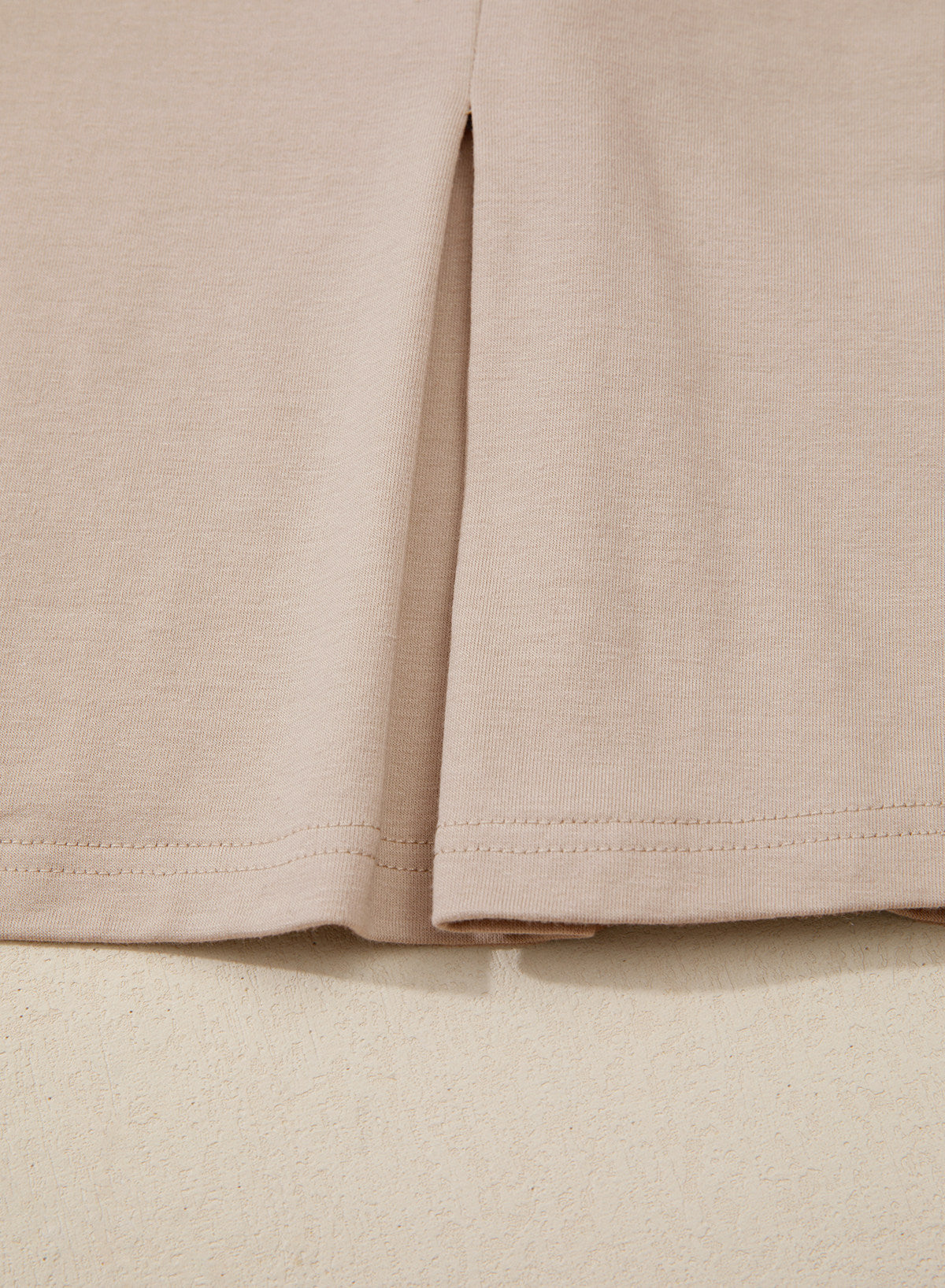 Camiseta tipo peplum con cintura ceñida y mangas 3/4 para uso casual en la oficina