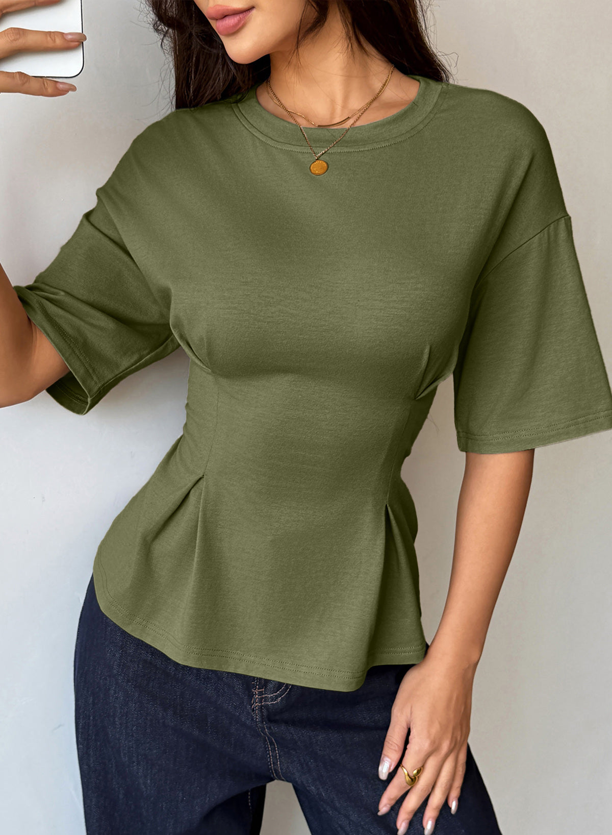 Camiseta tipo peplum con cintura ceñida y mangas 3/4 para uso casual en la oficina