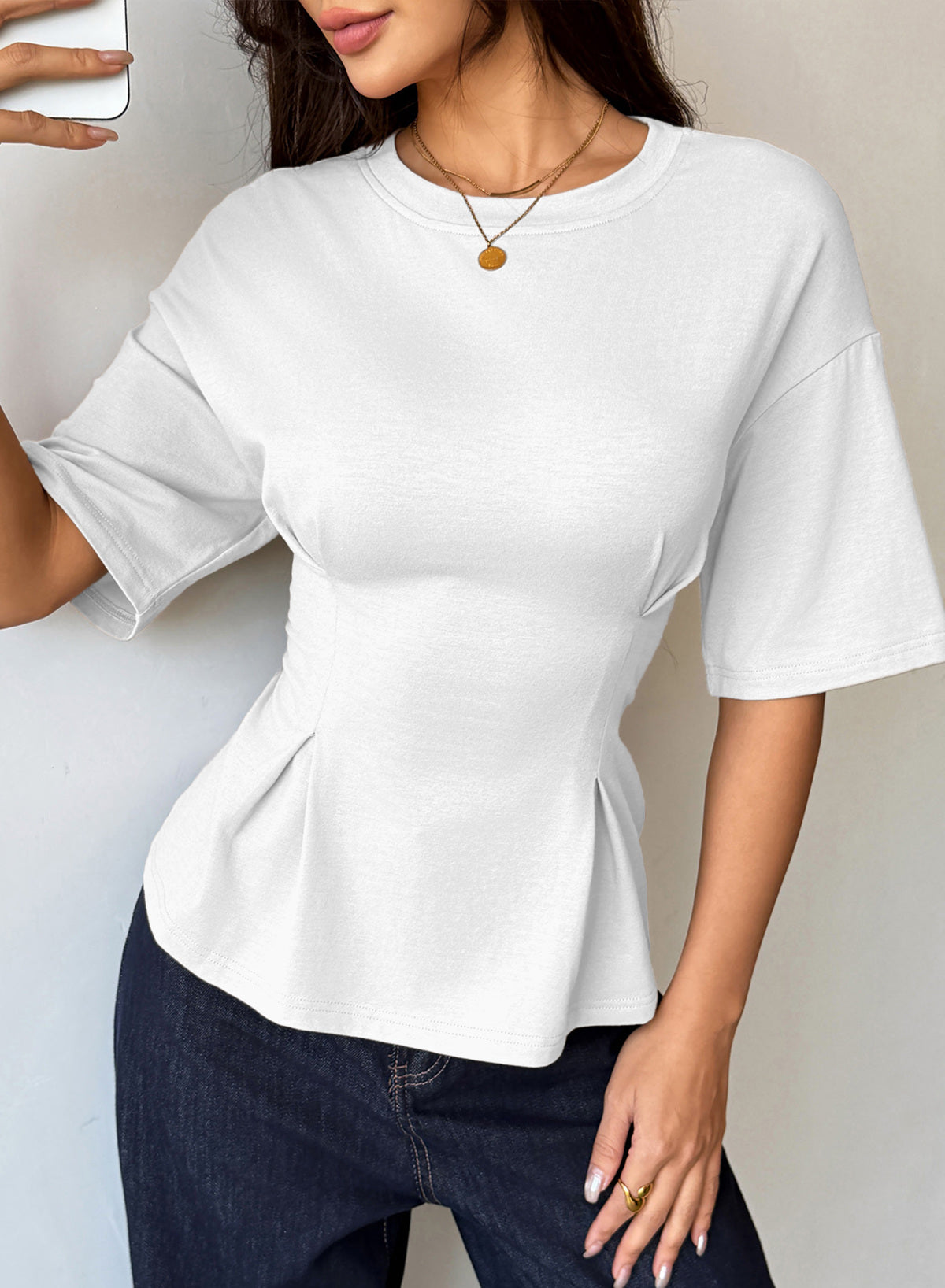 Camiseta tipo peplum con cintura ceñida y mangas 3/4 para uso casual en la oficina