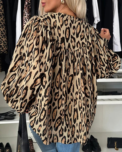 Blusa casual de manga larga con estampado de leopardo, cuello redondo y botones frontales