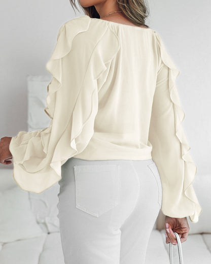 Blusa con escote en V y volantes en los hombros, diseño casual, con botones frontales, manga larga