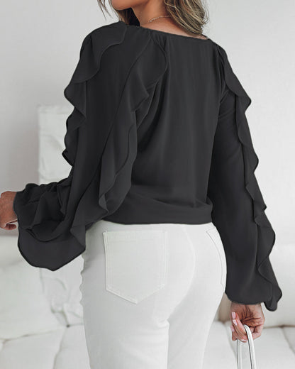 Blusa con escote en V y volantes en los hombros, diseño casual, con botones frontales, manga larga