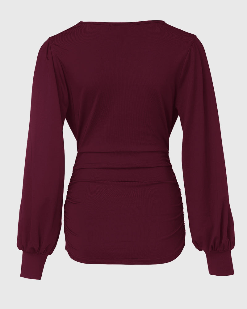 Blusa de escote en V profundo con mangas farol fruncidas, de estilo casual y ajuste entallado