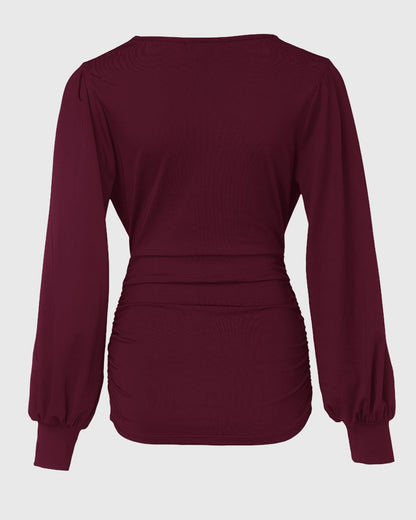 Blusa de escote en V profundo con mangas farol fruncidas, de estilo casual y ajuste entallado