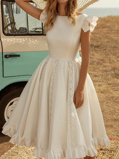 Vestido midi elegante de color sólido con mangas abullonadas