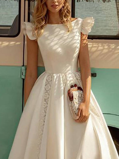 Vestido midi elegante de color sólido con mangas abullonadas