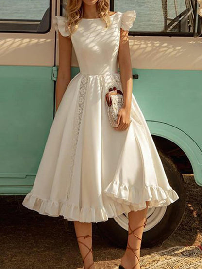 Vestido midi elegante de color sólido con mangas abullonadas