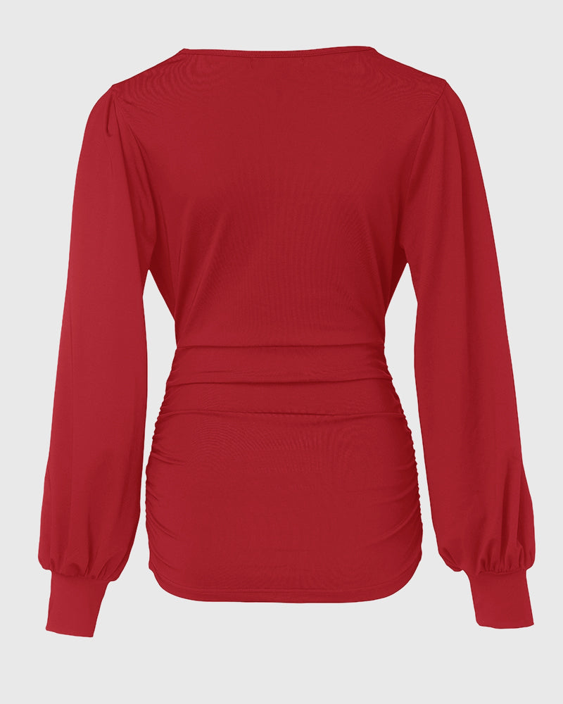 Blusa de escote en V profundo con mangas farol fruncidas, de estilo casual y ajuste entallado