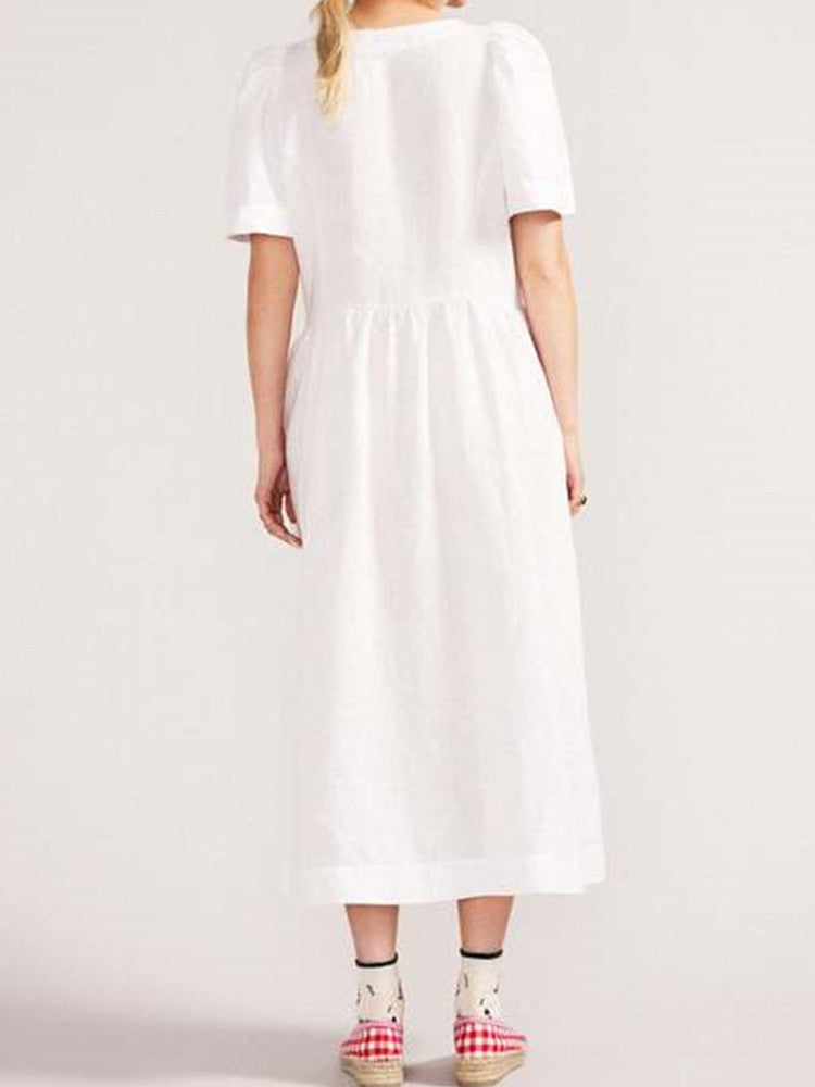 Vestido midi de lino blanco abotonado con escote en V y un bolsillo práctico
