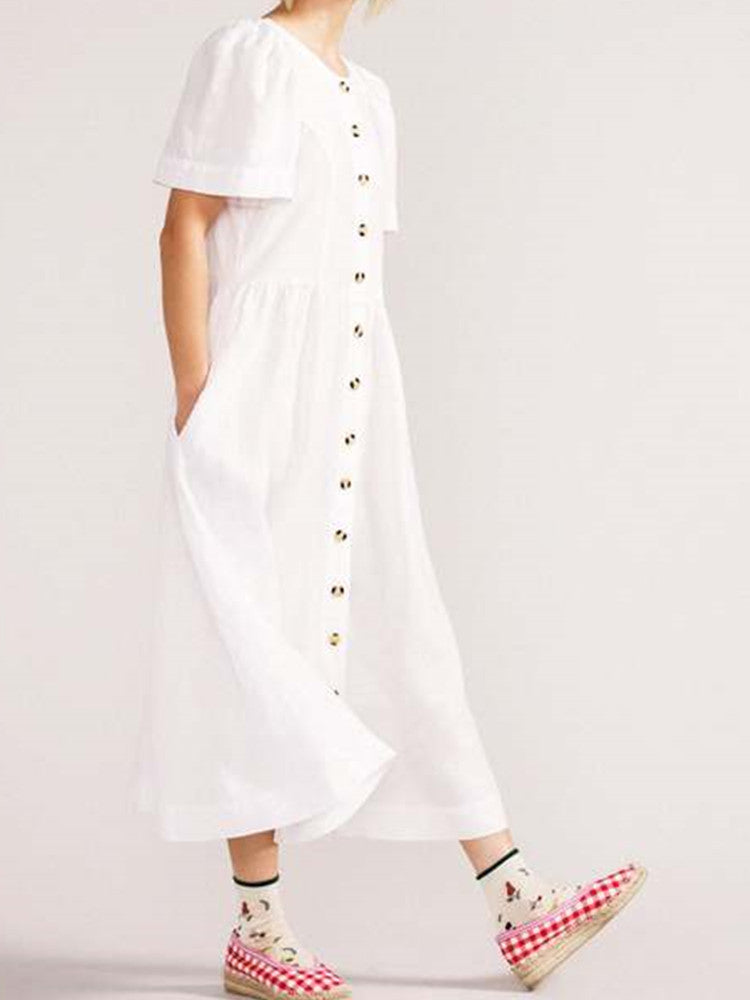 Vestido midi de lino blanco abotonado con escote en V y un bolsillo práctico