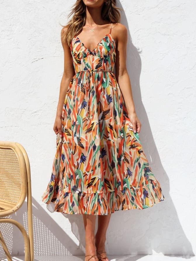 Vestido midi sin mangas con estampado floral y ribete de volantes delicados