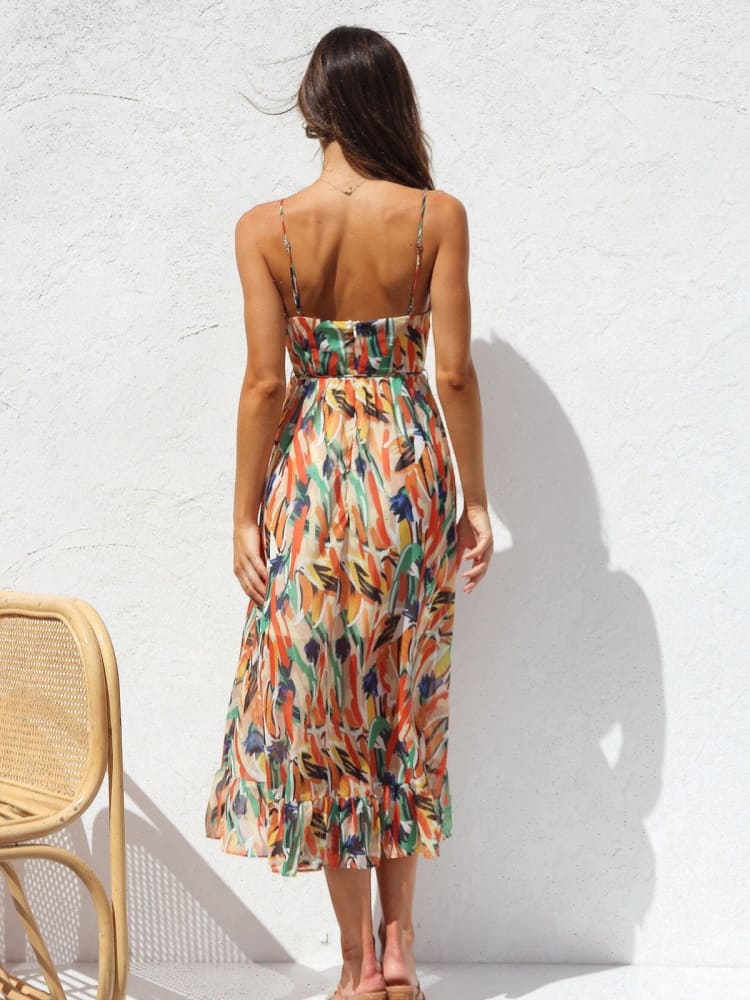 Vestido midi sin mangas con estampado floral y ribete de volantes delicados