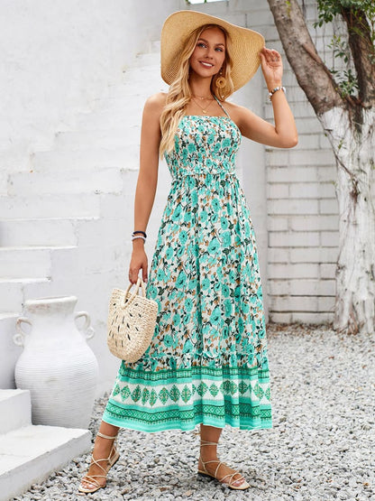 Vestido maxi de estampado floral con escote halter y corpiño fruncido
